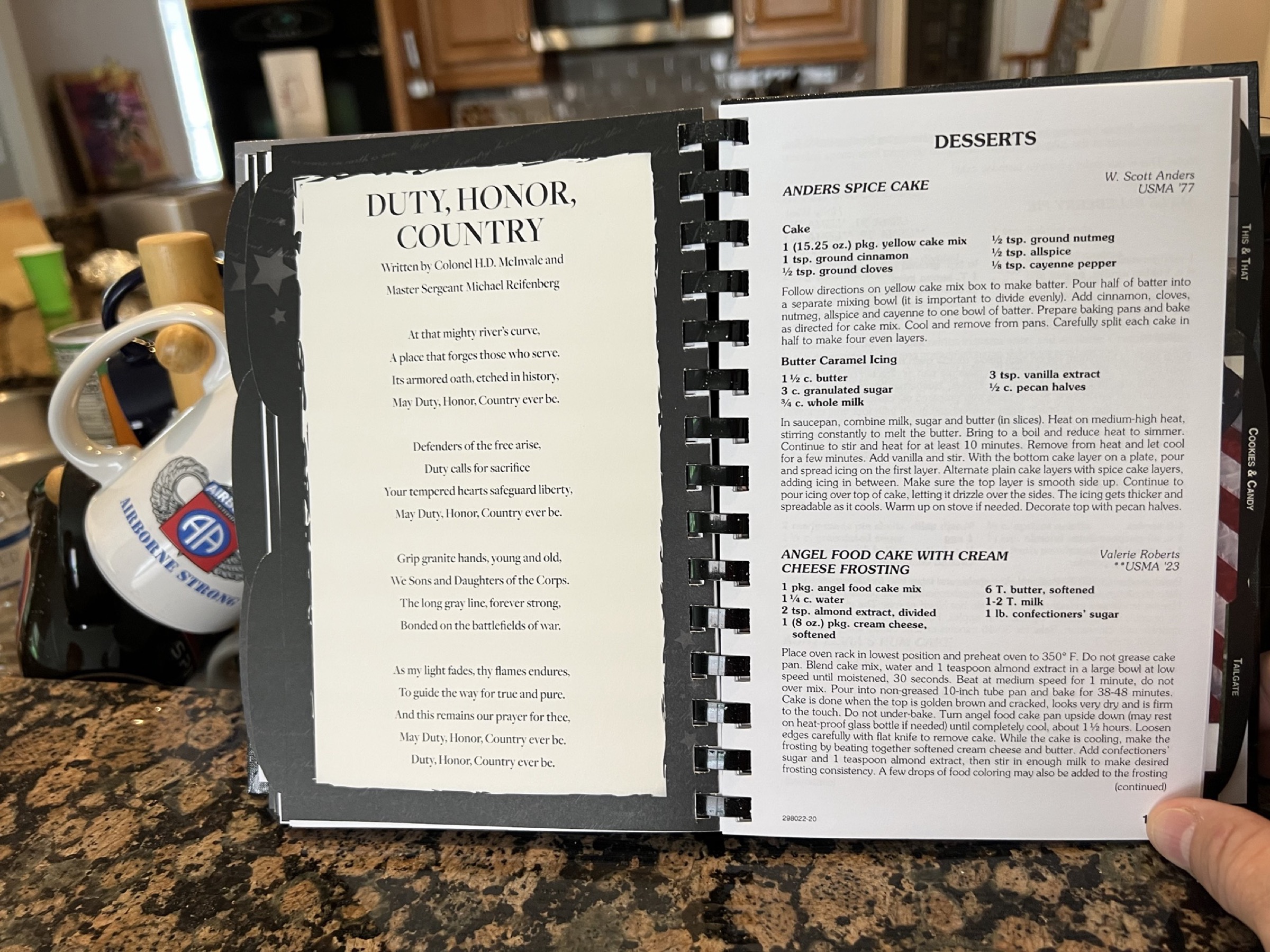 Open Sing Second Cookbook showing the Duty, Honor, Country lyric and a West Point recipe page